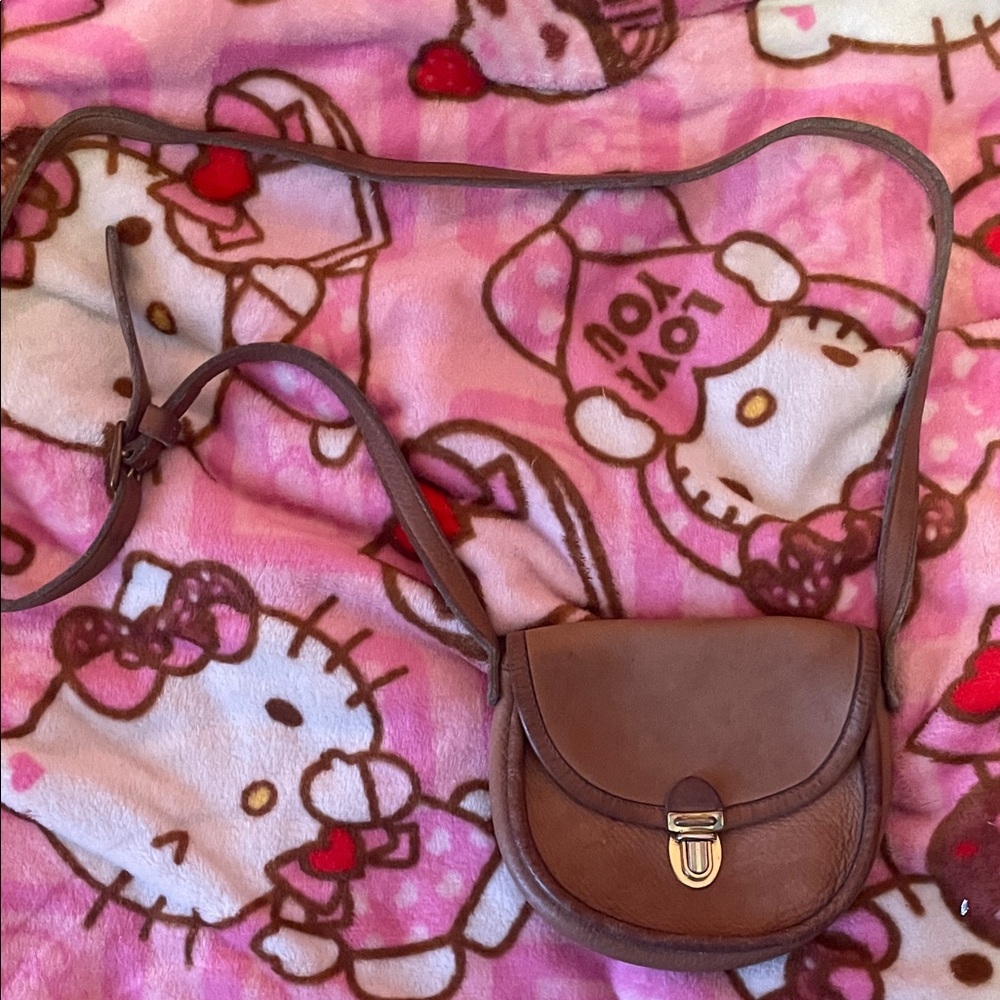 tiny brown crossbody bag
